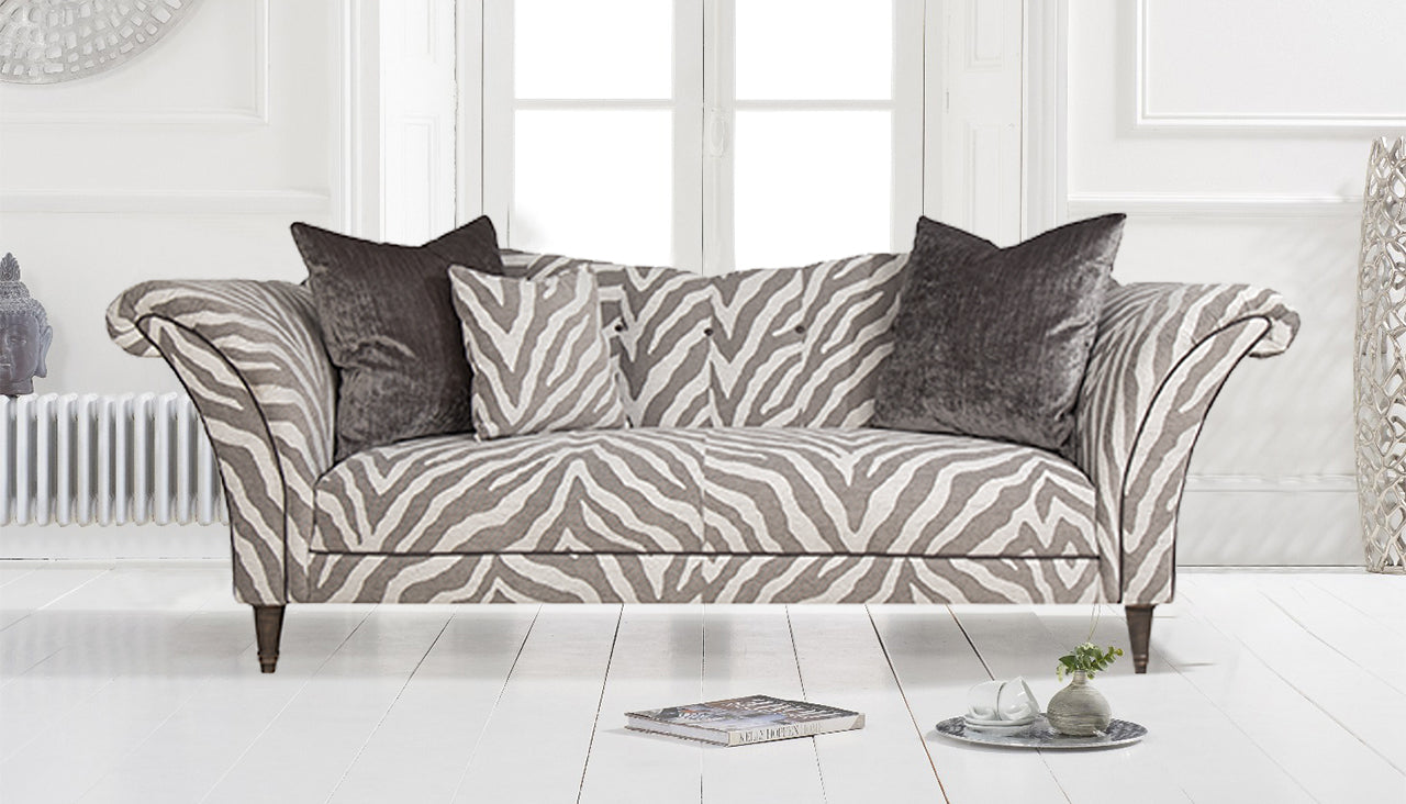 zebra print fabric chair with cushion and dark feet